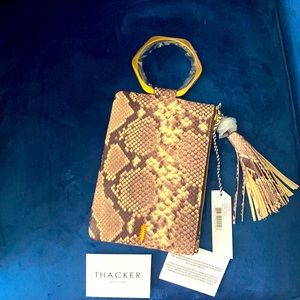 Wristlet snakeskin clutch so cute!